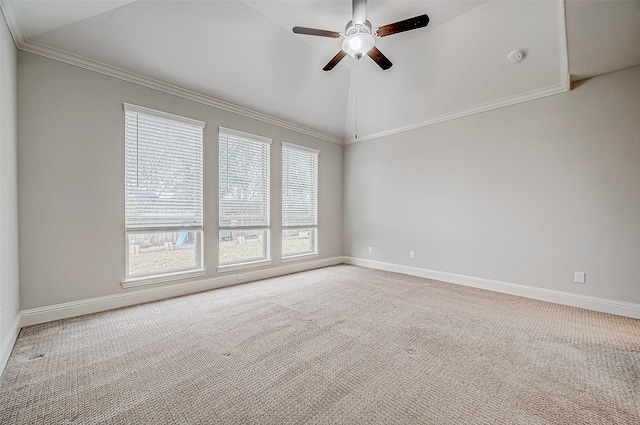 unfurnished room with ceiling fan, carpet, ornamental molding, and lofted ceiling