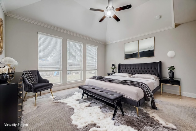 bedroom featuring lofted ceiling, carpet flooring, ceiling fan, and ornamental molding