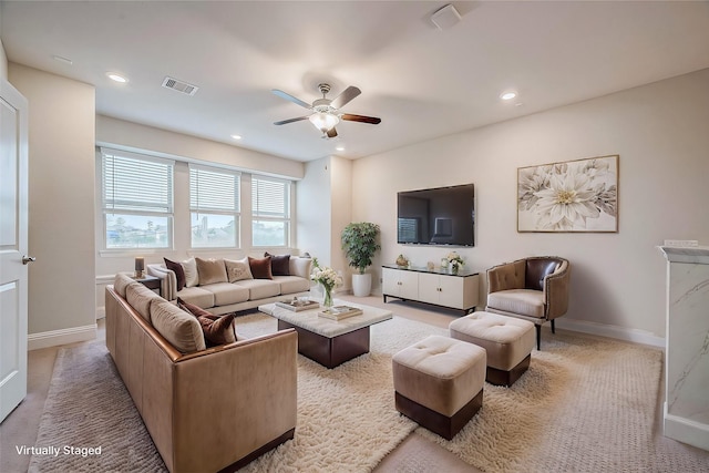 living room with ceiling fan