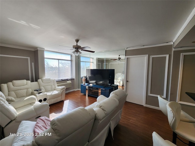 living room featuring ceiling fan, hardwood / wood-style floors, and crown molding