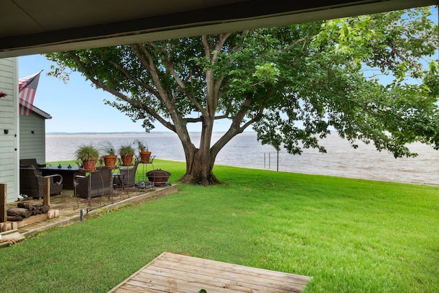 view of yard with a water view