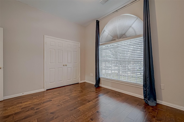 interior space with dark hardwood / wood-style flooring