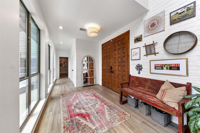 hallway featuring hardwood / wood-style flooring