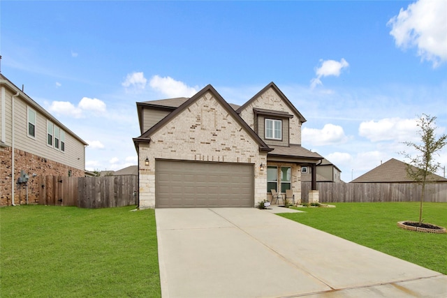 view of front of house featuring a garage and a front lawn