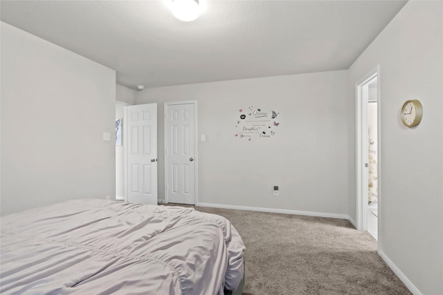 bedroom featuring carpet