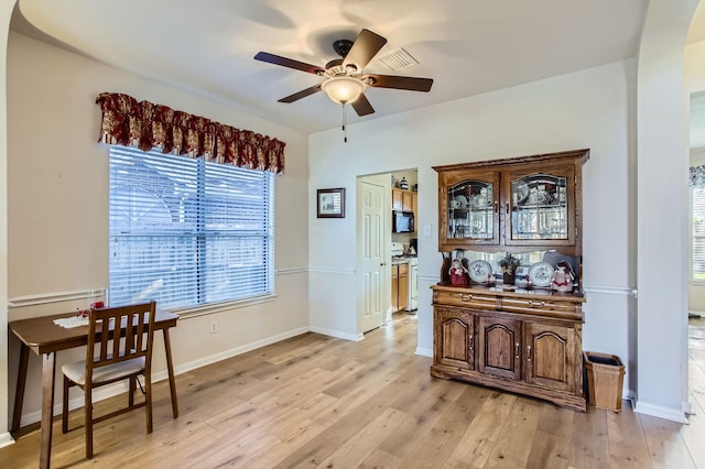 dining area featuring ceiling fan and light hardwood / wood-style floors