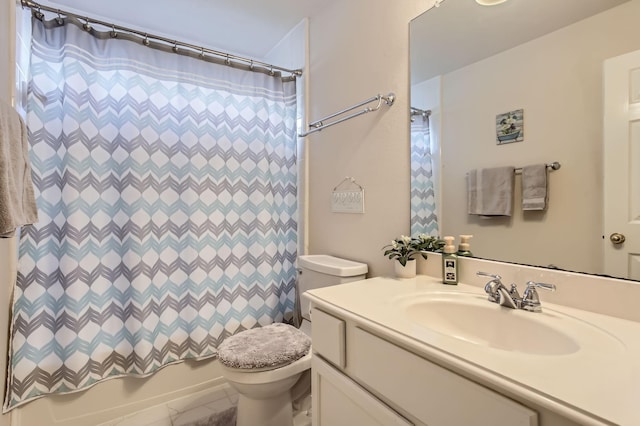 full bathroom featuring vanity, shower / bath combination with curtain, and toilet