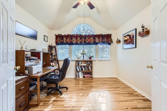 office area featuring vaulted ceiling, ceiling fan, and light hardwood / wood-style floors