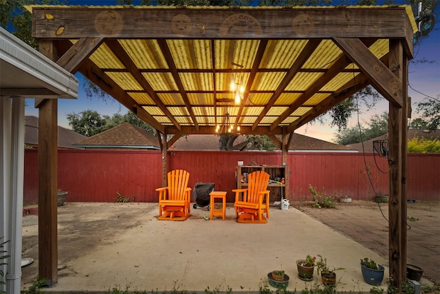 patio terrace at dusk with a pergola