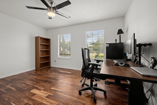 office area featuring dark hardwood / wood-style floors, a textured ceiling, and ceiling fan