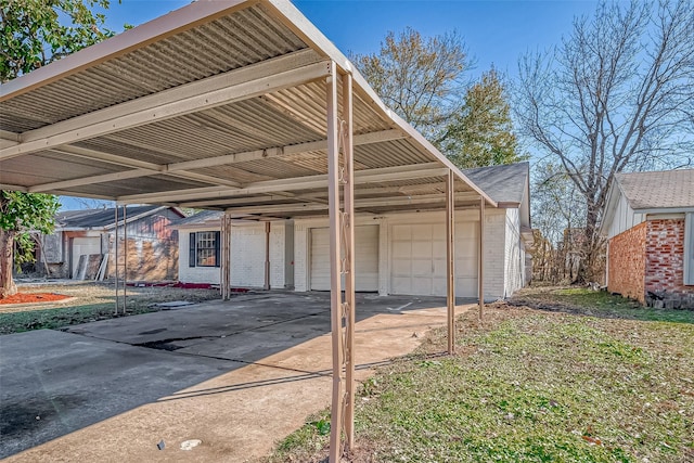 view of car parking featuring a garage and a carport