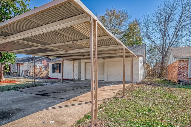 view of parking with a garage and a carport