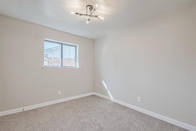 unfurnished room featuring carpet floors