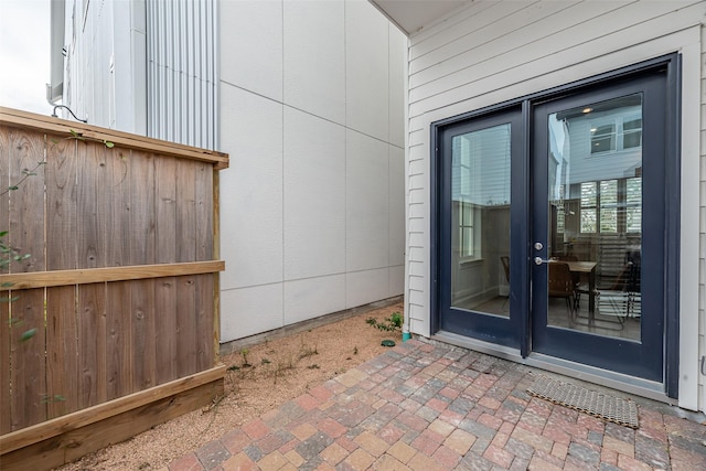 doorway to property featuring a patio and french doors