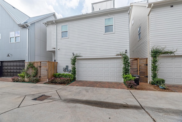 exterior space with a garage