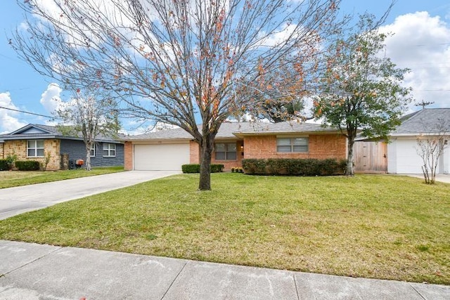 ranch-style house with a garage and a front lawn