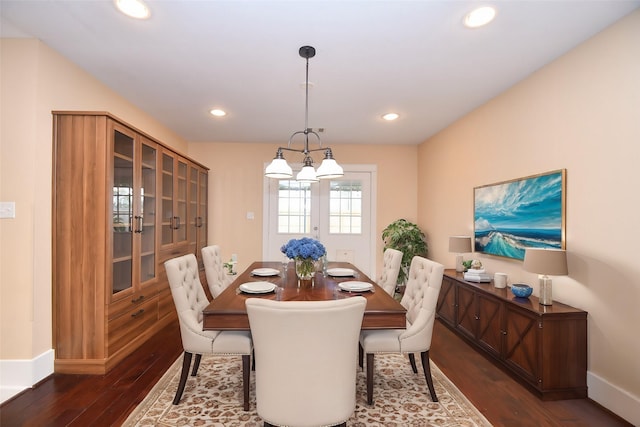 dining room with dark wood-type flooring