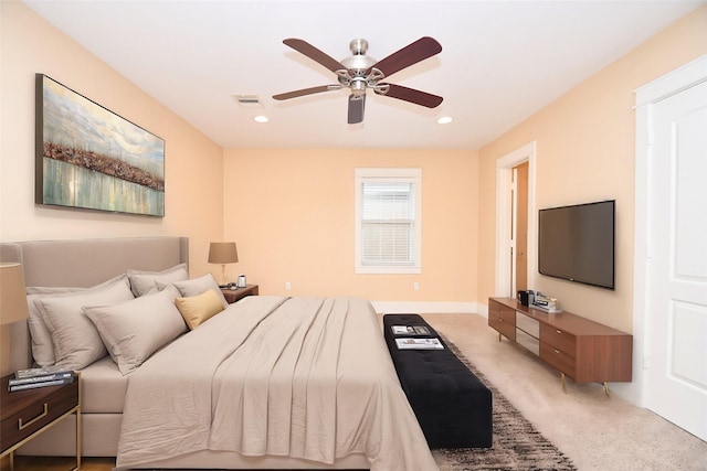 bedroom with ceiling fan and carpet floors