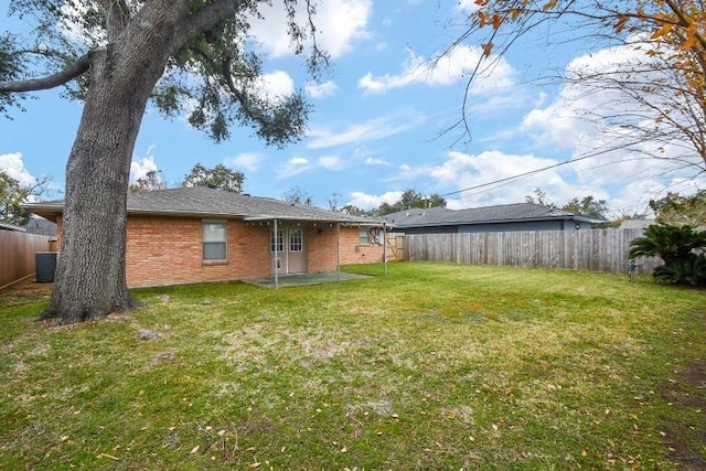 view of yard featuring central AC