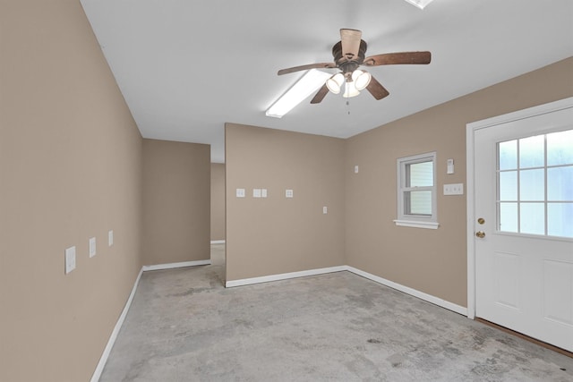 entrance foyer with ceiling fan