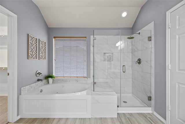 bathroom featuring lofted ceiling, separate shower and tub, and wood-type flooring