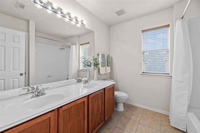 full bathroom featuring vanity, tile patterned flooring, toilet, and shower / tub combo with curtain