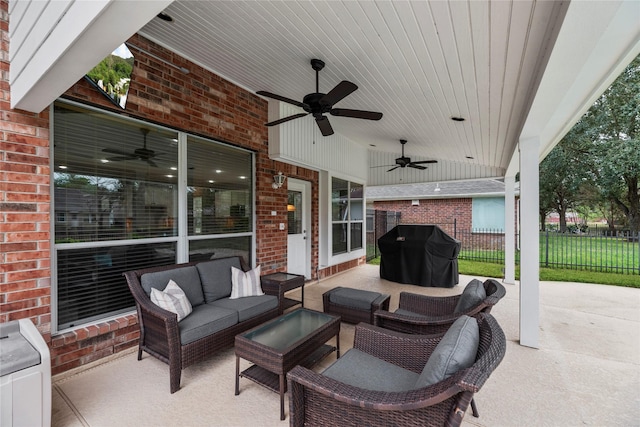 view of patio / terrace with outdoor lounge area, area for grilling, and ceiling fan