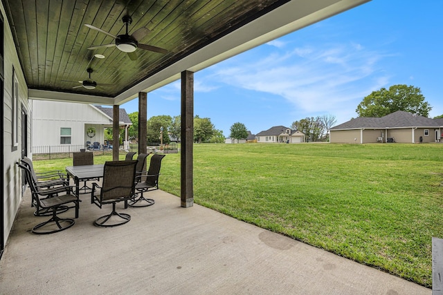 view of patio featuring ceiling fan