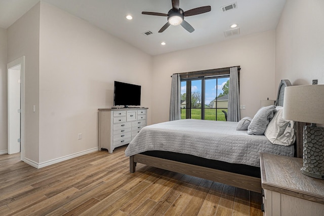 bedroom featuring ceiling fan, light hardwood / wood-style floors, and access to outside