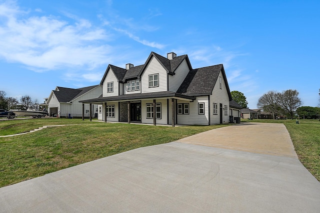 view of front of home with a front lawn