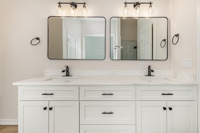 bathroom with vanity and an enclosed shower