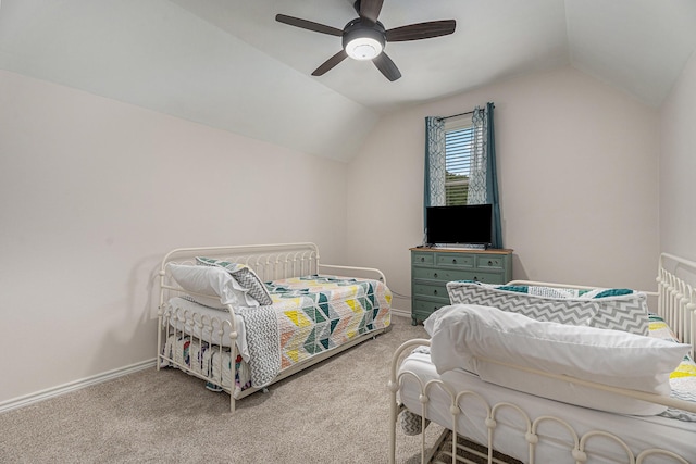 carpeted bedroom with lofted ceiling and ceiling fan