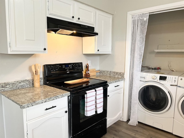 kitchen featuring white cabinets, dark wood-type flooring, electric range, and washer and clothes dryer