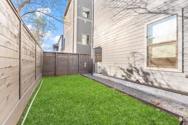 view of yard featuring central AC