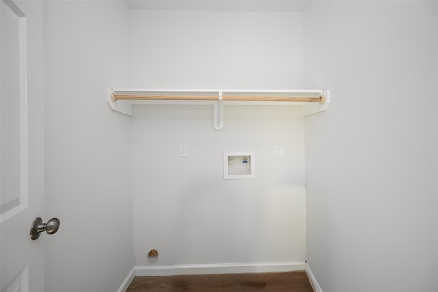 laundry area with hookup for a washing machine, electric dryer hookup, and dark wood-type flooring