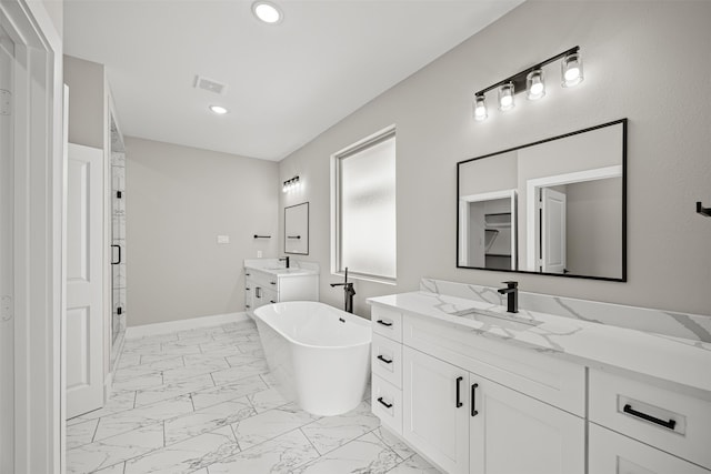 bathroom with vanity and plus walk in shower