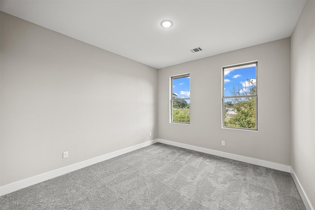 view of carpeted spare room