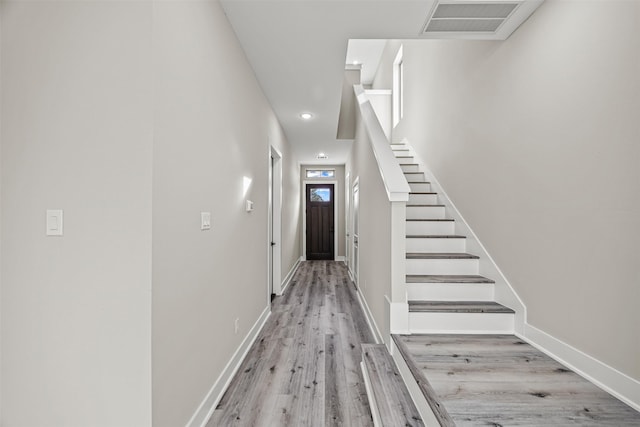 corridor featuring light wood-type flooring