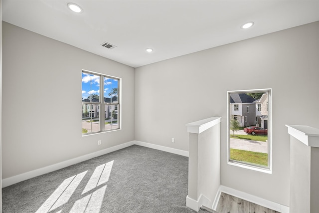 spare room with carpet flooring