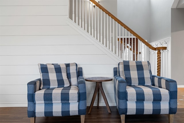 sitting room with dark hardwood / wood-style flooring