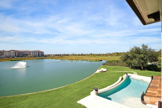 exterior space featuring a yard and a water view