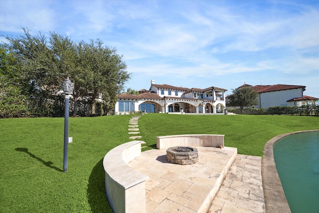 view of patio featuring a fire pit