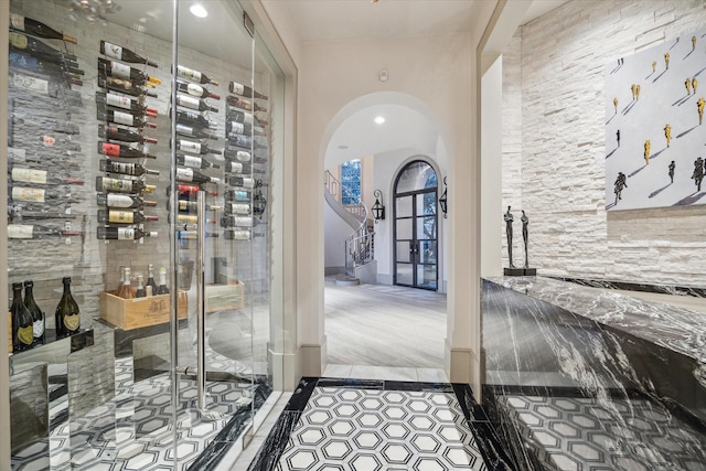 wine cellar with light tile patterned flooring