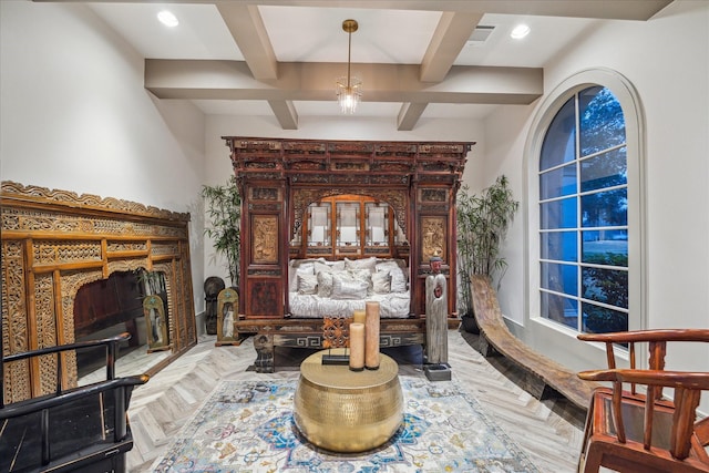 sitting room with coffered ceiling, parquet floors, and beamed ceiling