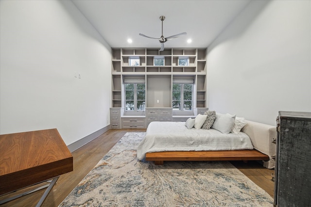 bedroom with hardwood / wood-style floors