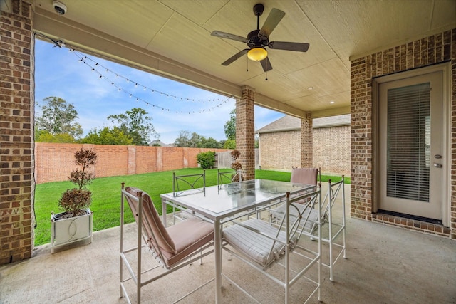 view of patio / terrace featuring ceiling fan