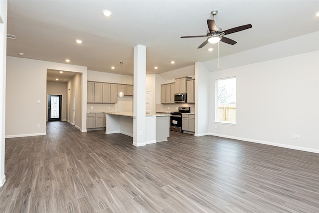 unfurnished living room with baseboards, light wood-type flooring, a ceiling fan, and recessed lighting