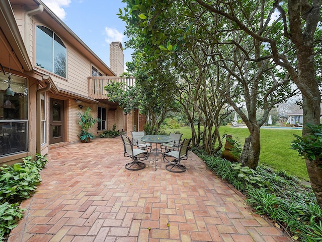 view of patio / terrace with a balcony