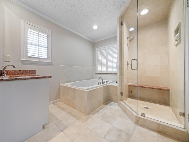 bathroom with plus walk in shower, vanity, crown molding, tile patterned floors, and a textured ceiling