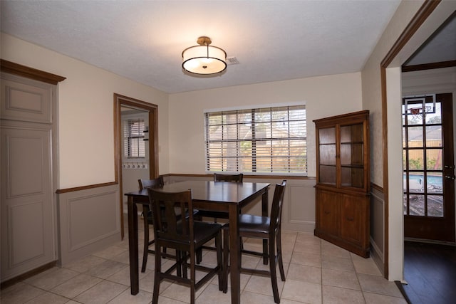 view of tiled dining space